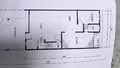 Floor plan: 2-bedroom 1-bathroom unit; features: open-plan kitchen-dining-living, master bedroom with ensuite bathroom, bedroom 2 with shared bathroom, utility room, central foyer, 1 car porch.