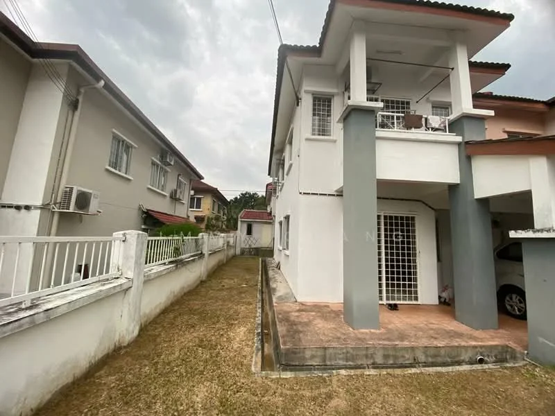 Exterior type: semi-detached house; features: two-storey structure, white painted facade, grey columns, terracotta roof tiles, manicured lawn, side walkway, fenced perimeter, visible air conditioning unit, driveway with car, outdoor patio area; style: modern.