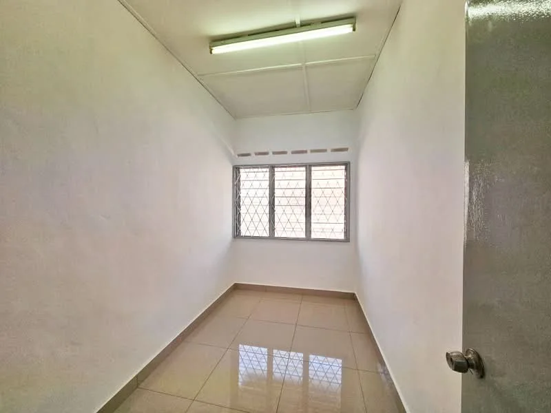 Room features: white painted walls, glossy tile flooring, ceiling lights, window with security grille, natural light from window.