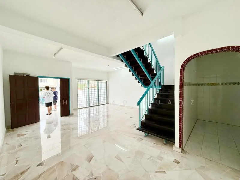 Room features: white painted walls, marble flooring, staircase with wooden steps and blue railing, large windows for natural light, arched doorway leading to another area, tile cladding in the archway, open layout, high ceiling; style: modern.