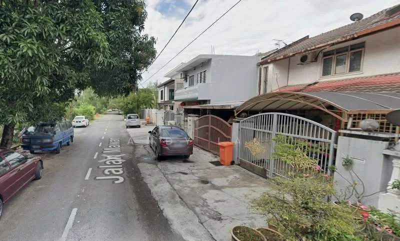 Exterior type: linked terrace house; features: two-storey building, red brick facade, gated entrance, car porch with awning, manicured lawn, paved driveway, surrounded by mature greenery, street view with parked cars; style: modern.