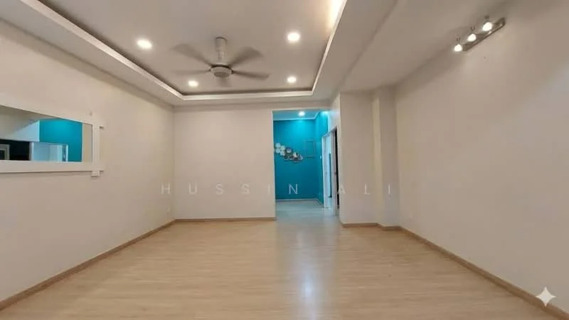 Living features: light wood laminate flooring, white painted walls, tray ceiling with recessed lighting, 5-blade ceiling fan, large mirror on wall, accent wall in teal, natural light from doorway, neutral decor; style: modern.
