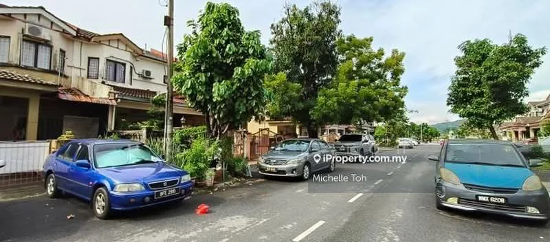 Exterior type: linked terrace house; features: two-storey building, cream painted facade, tiled roof, front porch area, manicured lawn, mature trees, paved driveway, street view with parked cars; style: modern.