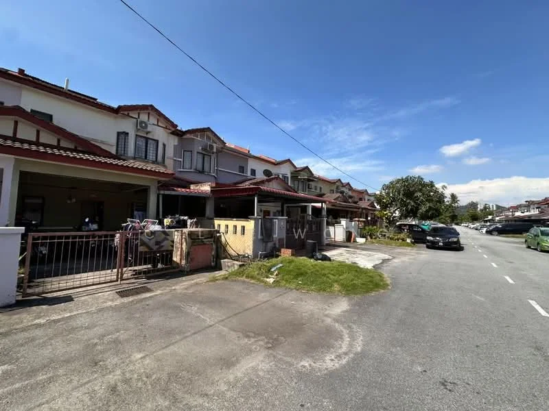 Exterior type: linked terrace house; features: red tiled roof, two-storey structure, white painted facade, front porch with gate, manicured lawn, paved walkway, driveway, street view, surrounded by residential area, clear blue sky; style: modern.