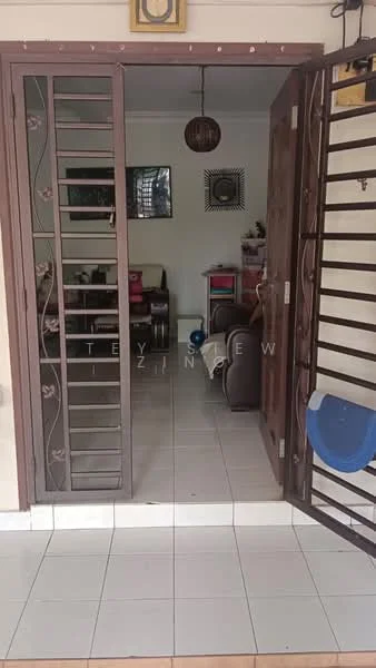 Room features: tiled flooring, wooden front door, metal security grille door, wall-mounted light fixture, open layout, living area visible, sofa, coffee table, decorative wall art, window with curtains; style: modern.