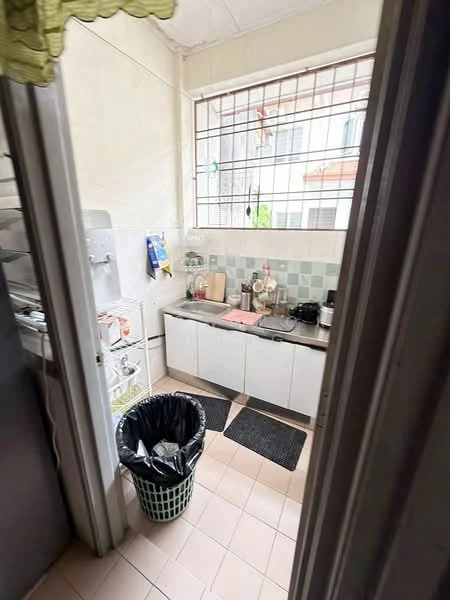 Kitchen features: white cabinetry, grey countertop, stainless-steel sink, chrome faucet, tile backsplash with blue and white pattern, built-in stove, microwave, kettle, coffee maker, refrigerator, trash bin, floor mat, window with metal grille, light fixture; style: modern.
