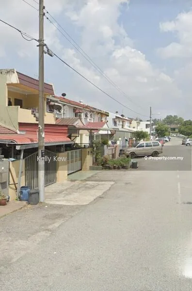 Exterior type: linked terrace house; features: two-storey linked terrace houses, red tiled roofs, cream painted facade, front garden with low hedges, driveway with interlocking pavers, street view with parked cars, power lines visible, sidewalk along the road; style: modern.