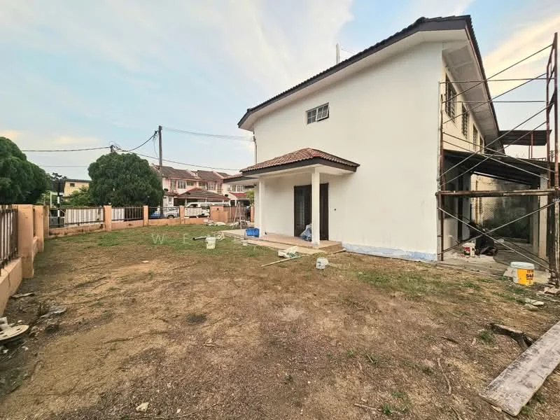 Exterior type: detached bungalow; features: white painted facade, flat roof, single-storey, manicured lawn, surrounded by fencing, scaffolding visible, concrete pathway, garden area, adjacent to residential street; style: modern.