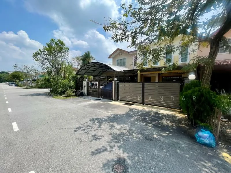 Exterior type: linked terrace house; features: two-storey building, grey painted facade, gated entrance, car porch with awning, manicured lawn, mature trees, paved driveway, surrounded by greenery, fronts a quiet residential street; style: modern.