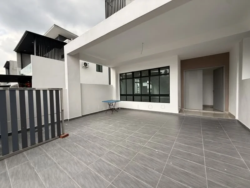 Room features: grey tiled flooring, white painted walls, large black-framed windows, sliding glass door, ceiling with no visible fixtures, open layout, outdoor space, partial wall with railing; style: modern.