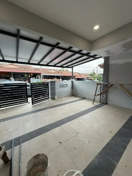 Exterior type: linked terrace house; features: covered patio with metal roof, grey tiled flooring, black metal railing, concrete wall, sliding gate, wooden support structure, outdoor lighting, open space, surrounded by residential area; style: modern.