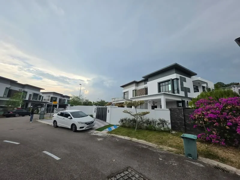 Exterior type: detached bungalow; features: white painted facade, grey accent wall, flat roof, manicured lawn, mature trees, bougainvillea, driveway with interlocking pavers, surrounded by greenery, two-storey structure, car porch with awning; style: modern.