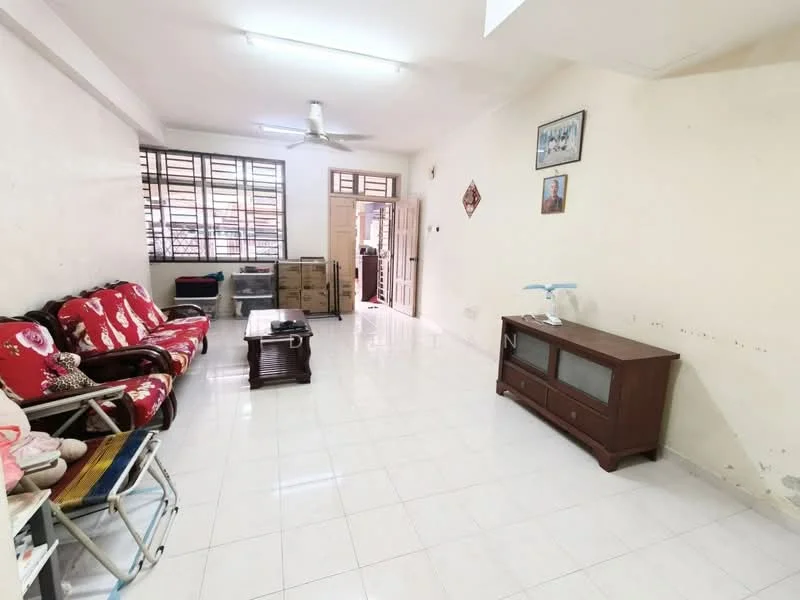 Living features: white painted walls, glossy white tile flooring, 5-blade ceiling fan, sofa with red floral upholstery, wooden coffee table, TV console, large windows with metal grilles, decorative wall art, cardboard boxes in background.