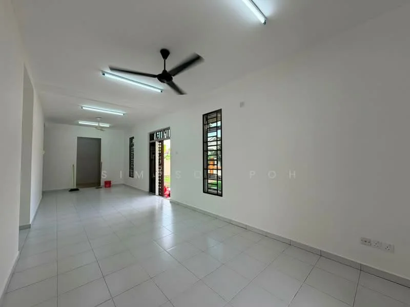 Room features: white painted walls, glossy white floor tiles, ceiling fan, two windows with black metal grilles, door leading outside, light fixtures on ceiling, open layout, no visible furniture; style: modern.