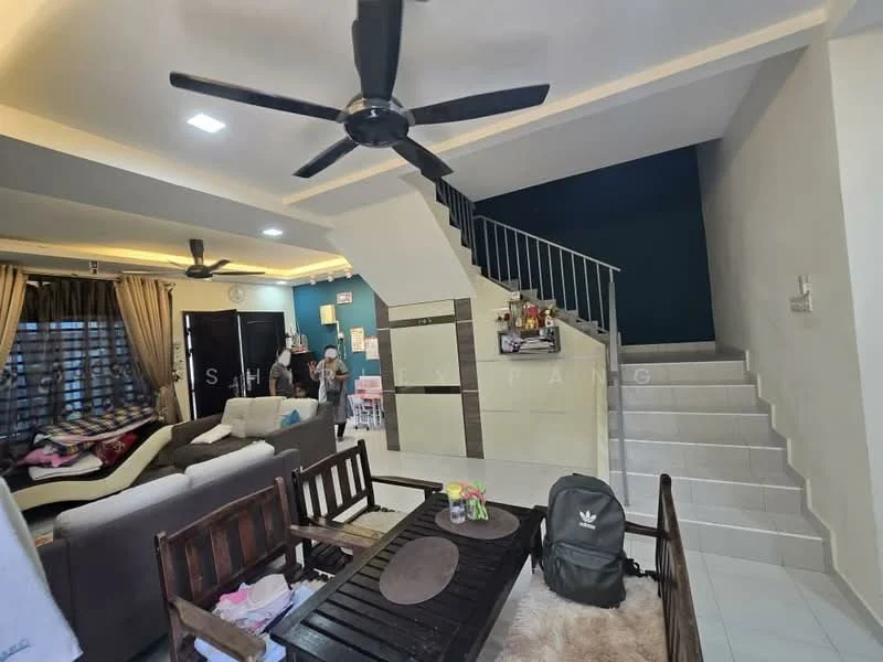 Living features: 3-seater fabric sofa in beige, wooden coffee table, area rug with geometric pattern, 5-blade ceiling fan with light, wall-mounted TV, decorative wall with dark blue paint, large window with sheer curtains, staircase with metal railing, light-colored tiled flooring, wall-mounted shelves, framed artwork, decorative plants; style: modern. Room features: white painted walls, light-colored staircase, open layout.