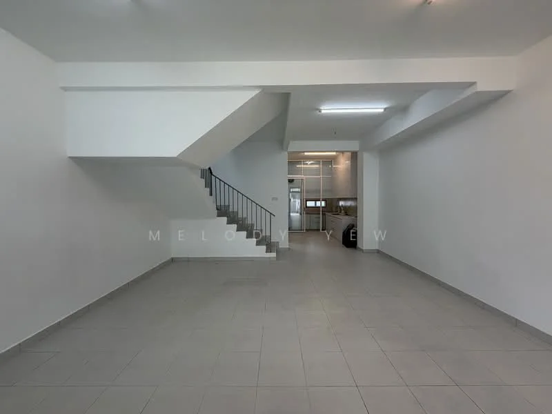 Room features: white painted walls, grey tiled flooring, staircase with metal railing, recessed ceiling lights, open layout, large windows, kitchen area visible in the background, no visible furniture; style: modern.