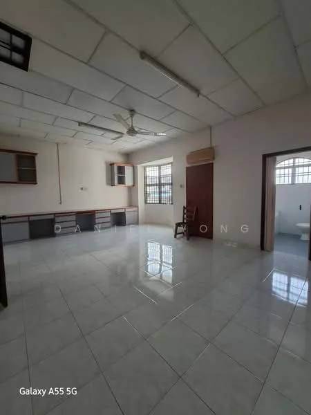 Room features: white painted walls, glossy ceramic tile flooring, ceiling with fluorescent lights, 5-blade ceiling fan, large window with grid pattern, wooden door, built-in cabinetry with grey finish, open layout, corner chair; style: modern.