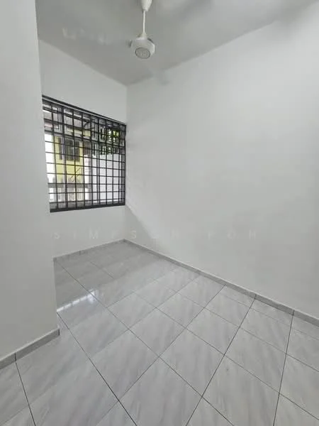 Room features: white painted walls, grey tiled flooring, ceiling fan, grid window with metal bars, natural light from window; style: minimalist.