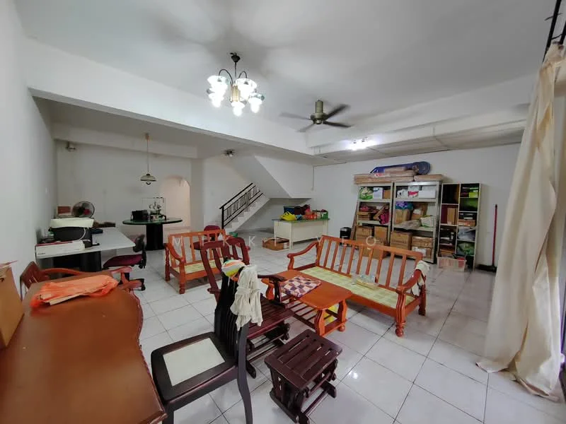 Living features: white painted walls, glossy tile flooring, 5-blade ceiling fan with light, chandelier, wooden sofa set, wooden coffee table, wooden side table, dining table with chairs, storage shelves with boxes, open layout, natural light from windows; style: modern.