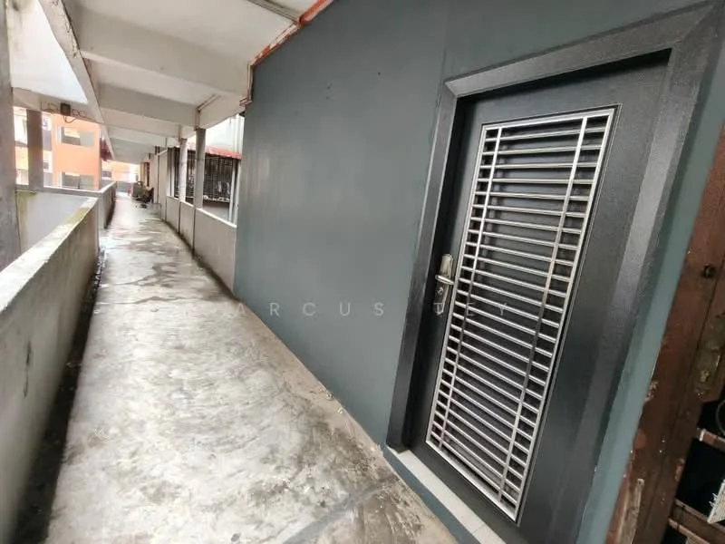 Exterior features: grey painted walls, metal security door with grille, concrete flooring, covered walkway, overhead roof, exposed concrete ceiling; style: modern.