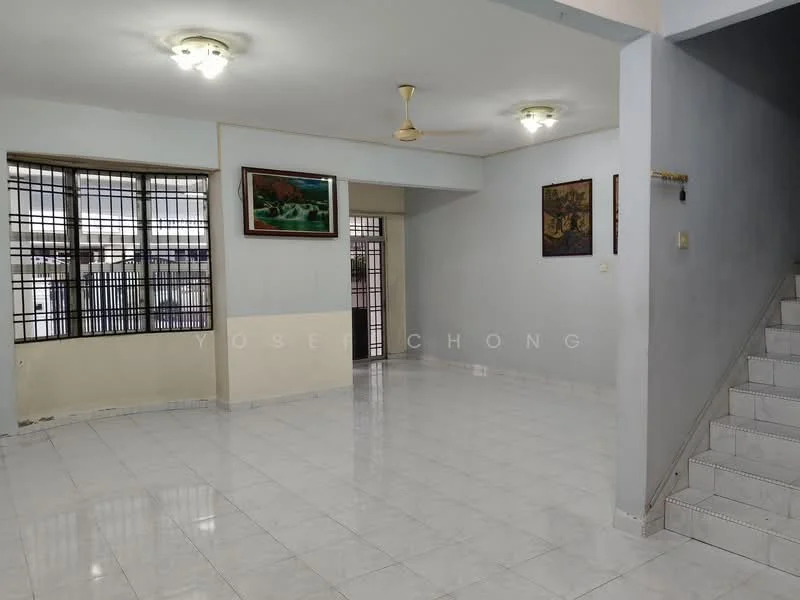Living features: white painted walls, glossy white tile flooring, ceiling fan, two ceiling lights, large windows with metal grilles, staircase leading to upper floor, decorative wall art, open layout.