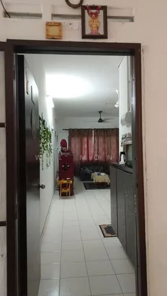 Room features: white painted walls, tile flooring, ceiling fan, curtains in red, sofa in dark color, decorative wall art, open doorway, kitchen cabinetry visible, doorway leading to another room; style: modern.