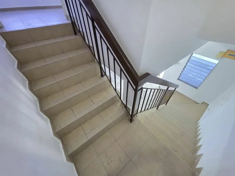 Room features: tiled flooring, white painted walls, wooden handrail, staircase with landing, natural light from window, metal railing, neutral color scheme; style: modern.