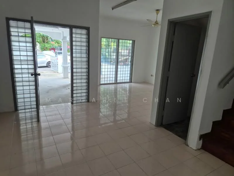 Room features: white painted walls, glazed tile flooring, ceiling fan, sliding glass doors, large windows, natural light, open layout, staircase visible in background; style: modern; view: garden.