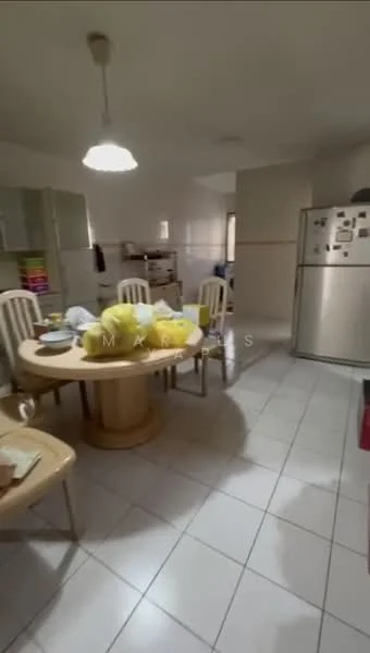 Kitchen features: round dining table, 4 dining chairs, stainless-steel fridge, white tiled flooring, white walls, kitchen cabinets, countertop, overhead lighting, window with natural light.