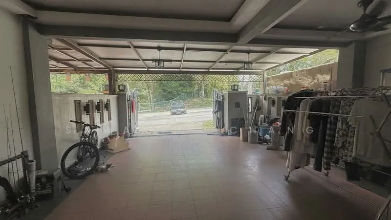Room features: concrete flooring, exposed beams on ceiling, large open space, multiple storage cabinets, clothes rack with hanging clothes, bicycle, wall-mounted hooks, natural light from large opening, sliding door, visible outdoor area, parking space visible outside; style: industrial; view: outdoor.