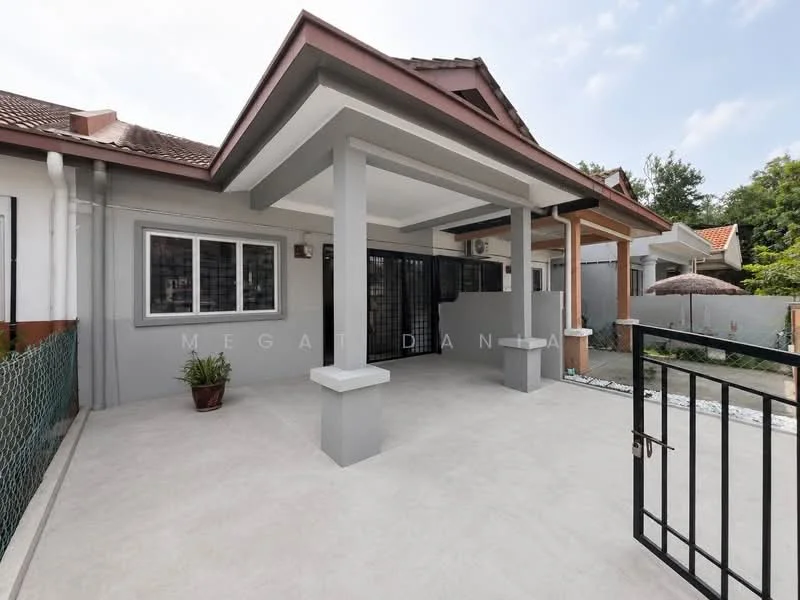 Exterior type: linked terrace house; features: grey painted facade, pitched tile roof, front porch with columns, metal gate, concrete flooring, manicured landscaping, fenced yard, outdoor seating area, surrounded by greenery; style: modern.