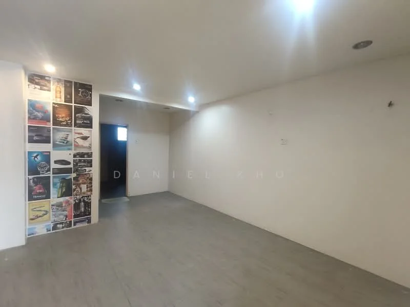 Room features: white painted walls, grey laminate flooring, recessed downlights, wall with poster collage, doorway leading to another room; style: modern.