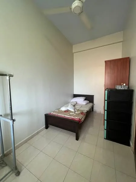 Bedroom features: single bed, mattress with bedding, wooden bed frame, ceiling fan, tiled flooring, light-colored walls, wardrobe, black storage cabinet, window with natural light.