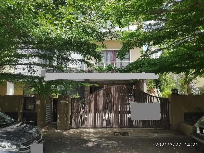 Exterior type: detached bungalow; features: two-storey building, wooden gate, manicured lawn, mature trees, paved driveway, balcony on upper floor, front porch, surrounded by greenery; style: modern.
