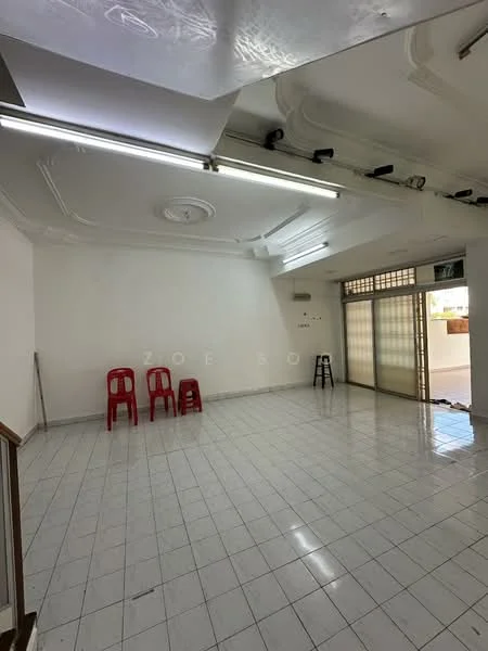 Room features: white painted walls, glossy tile flooring, tray ceiling with ceiling rose, recessed lighting, large windows, sliding glass door, three red plastic chairs, one black stool, open layout, natural light from windows; style: modern.