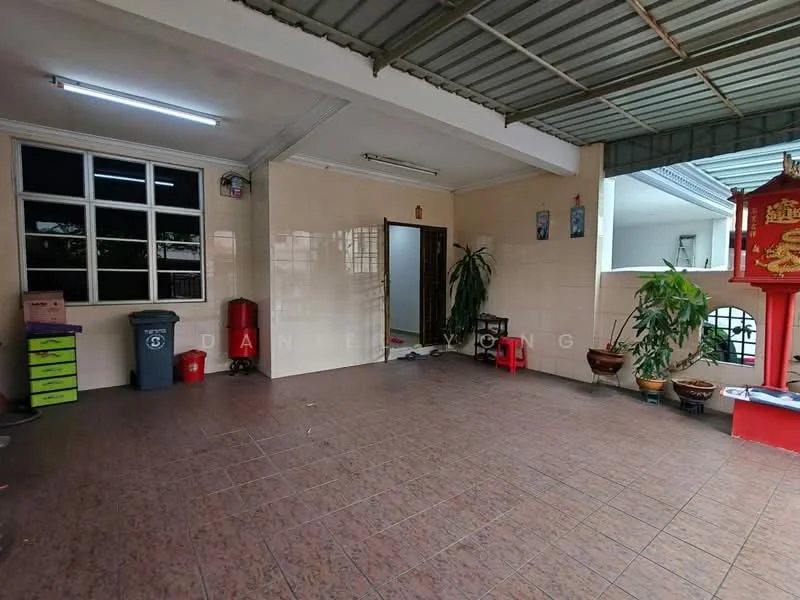 Room features: tiled flooring, white painted walls, large windows, green potted plants, red trash bin, green storage cabinet, decorative wall art, open layout, ceiling with metal roofing; style: modern.