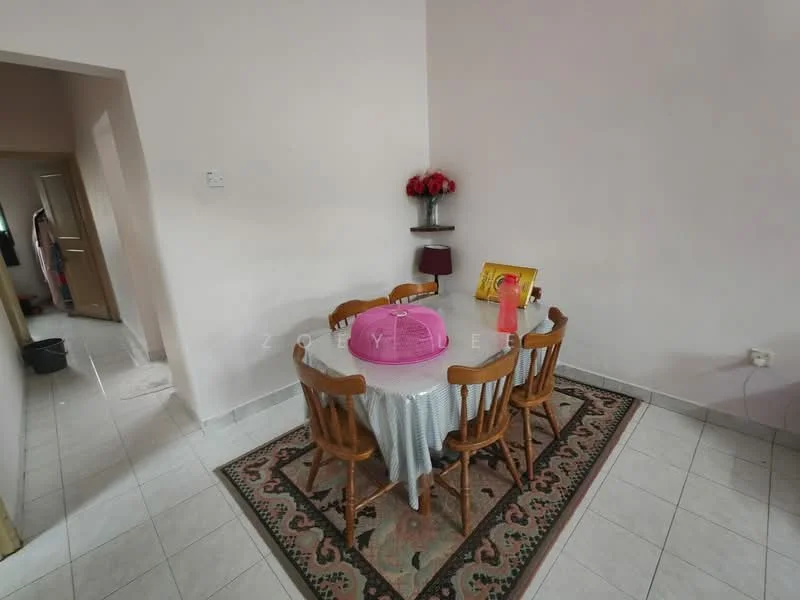 Dining features: round dining table, 6 wooden dining chairs, tablecloth with checkered pattern, decorative vase with flowers, framed artwork on wall, area rug with floral pattern, white painted walls, ceramic tile flooring; style: traditional.