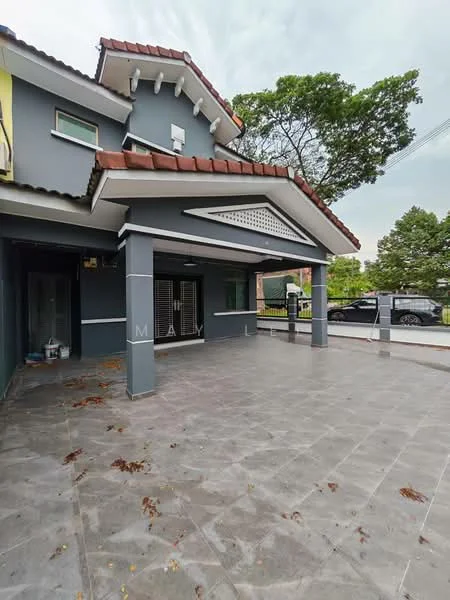 Exterior type: semi-detached house; features: grey painted facade, red tiled roof, covered porch area, large paved driveway, front garden area, windows with grilles, gutter system, surrounding greenery; style: modern.