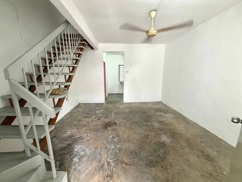 Room features: white painted walls, concrete flooring, ceiling fan, staircase with wooden steps and metal railing, doorway leading to another room; style: minimalist.