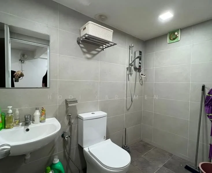 Bathroom features: grey tiled walls, grey tiled flooring, white toilet, single-sink vanity with wall-mounted mirror, chrome basin mixer faucet, shower with handheld shower head, wall-mounted shower control, open shelving for toiletries, towel rack, LED ceiling lights; style: modern.