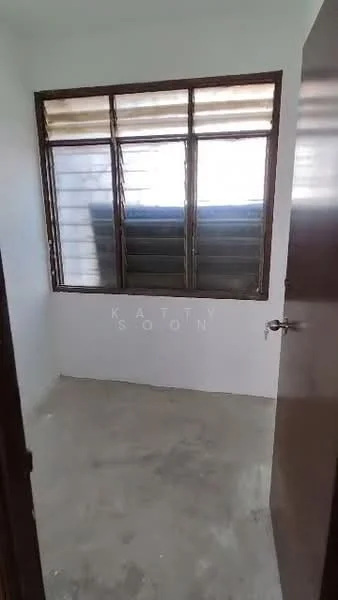 Room features: plain white walls, concrete flooring, single window with horizontal slats, wooden door, no visible furnishings; style: minimalist.