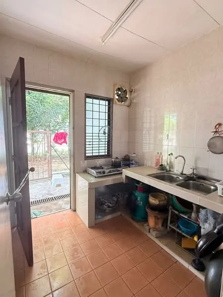 Kitchen features: white tiled walls, ceramic tile flooring, double-bowl stainless-steel sink, chrome pull-down faucet, kitchen countertop, gas stove with burners, exhaust fan, window with security bars, open shelving, storage cabinets, visible outdoor area through door; view: garden.