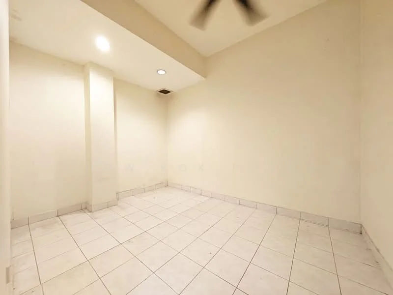 Room features: white painted walls, tile flooring, ceiling light, ceiling fan, corner space, no visible windows, empty room.