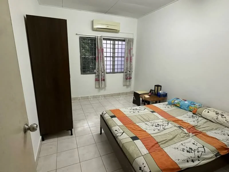 Bedroom features: queen-size bed with patterned bedding, wooden wardrobe, window with sheer curtains, air conditioning unit, tile flooring, bedside table, decorative throw pillows, wall-mounted light fixture.