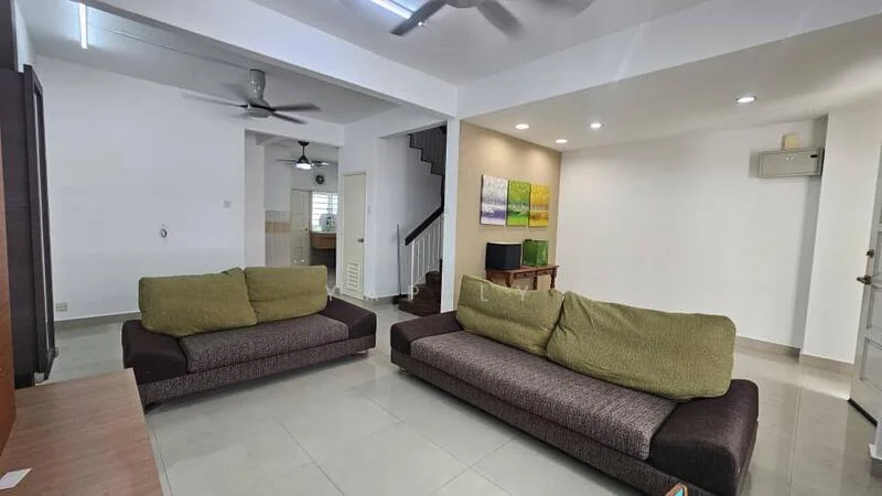 Living features: 2 fabric sofas in green and brown, coffee table, wall-mounted TV, recessed LED downlights, ceiling fan, white painted walls, grey tiled flooring, decorative artwork on wall, open layout to adjacent areas; style: modern. Room features: staircase leading to upper floor, white painted walls, ceiling fan.