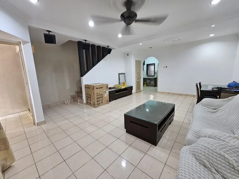 Living features: cream painted walls, white ceiling with recessed downlights, 5-blade ceiling fan, tile flooring, large coffee table with glass top, sofa with light upholstery, wooden TV console, staircase leading to upper floor, boxes for storage, dining table in background, open layout; style: modern.