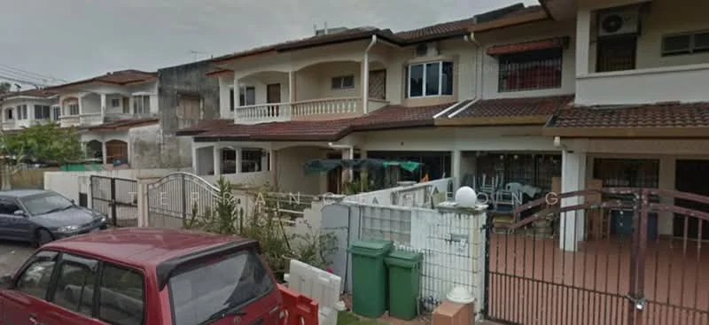 Exterior type: linked terrace house; features: two-storey building, red brick facade, cream painted walls, pitched tile roof, recessed balconies, manicured lawn, fenced front yard, driveway with interlocking pavers, visible parking spaces, security gate, surrounded by greenery; style: modern.