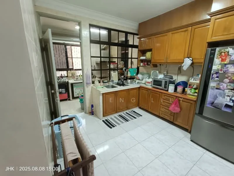 Kitchen features: wood cabinetry in brown, white tiled backsplash, stainless-steel fridge, built-in microwave, freestanding range oven, single-bowl stainless-steel sink, chrome pull-down faucet, ceramic tile flooring, window with black metal frame, countertop with clutter, kitchen island with seating, dishwasher, open shelving, decorative items on shelves; style: modern.