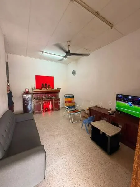 Living features: grey fabric sofa, wooden TV console, wall-mounted TV, ceiling fan, decorative wall with red accent, marble flooring, light-colored painted walls, small coffee table, reclining lounge chair; style: minimalist.