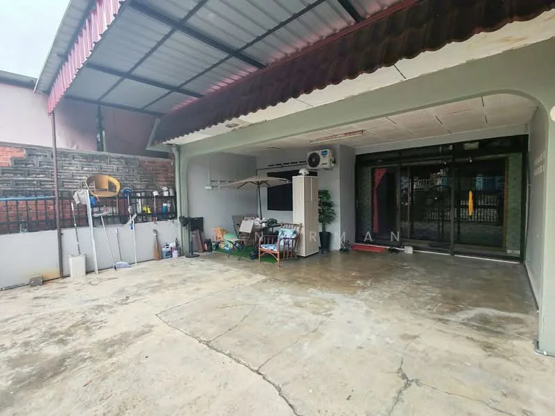 Exterior type: linked terrace house; features: covered car porch, concrete flooring, wall-mounted split AC unit, manicured landscaping, exposed brick wall, sliding glass door, awning over car porch, outdoor furniture, utility area with storage, fenced perimeter; style: modern.